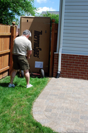 wheeling-hot-tub-through-gate.jpg