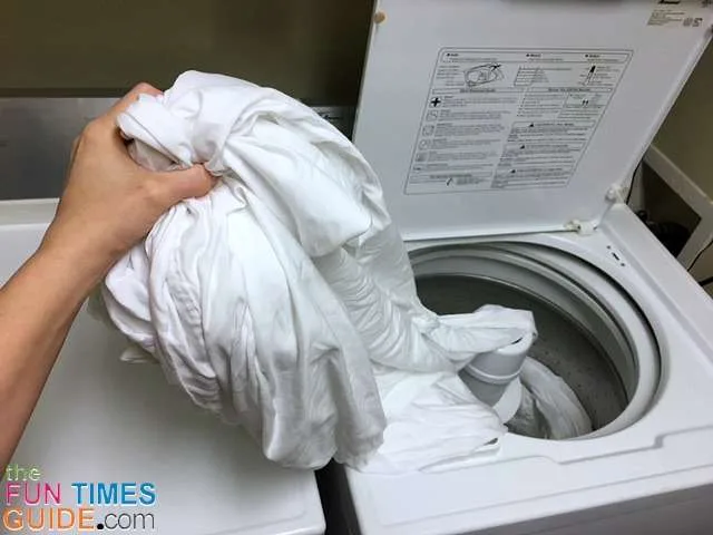 For the final step in this solo sheet drying method, I moved the remaining flat sheet from the washer into the dryer.