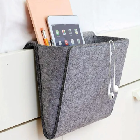 A softly cushioned bedside caddy for all your gadgets... and snacks!