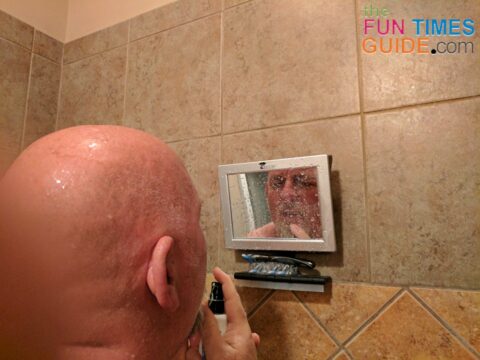 Jim using the ToiletTree fog free shower mirror.