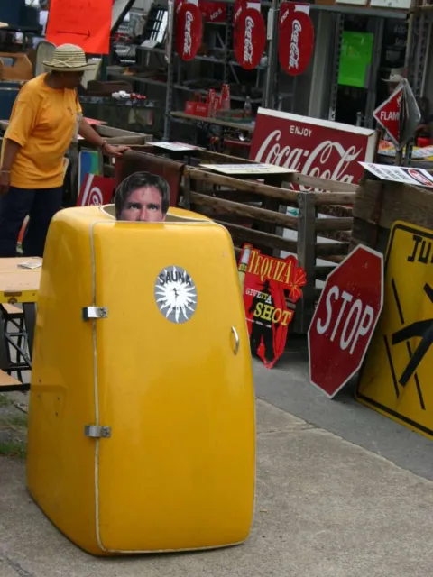 This old-timey sauna attracts a lot of attention. Why? Oddly shaped. Bright color. And people wonder what the heck it is! Try to think of unusual items like that to display at YOUR yard sale! 