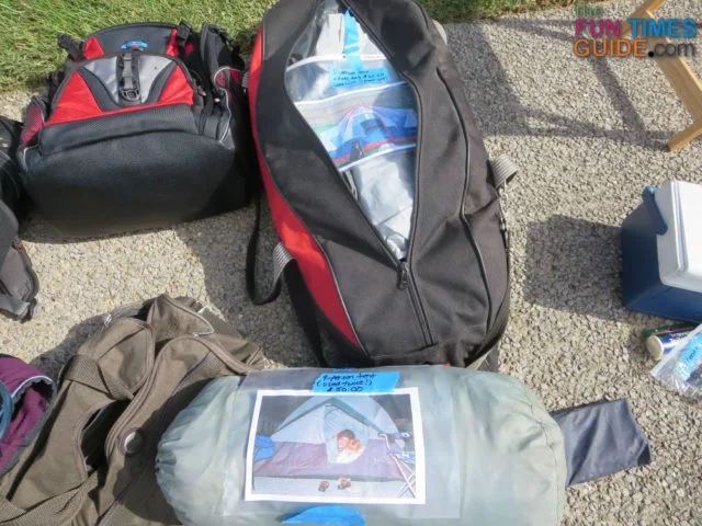 Two of the camping tents I sold at my yard sale. You can see that I taped photos of us actually using the tents - so shoppers could see how large the tents were, where the doors were placed, the colors, etc. 