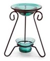 Glass candle oil burner.