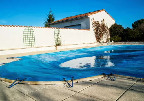 If you don't use your inground swimming pool anymore, here are some clever ways to PERMANENTLY cover it so that you can re-use the space for something else.