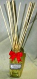 Diffuser reeds in a glass vase.