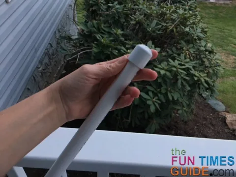 Putting an end cap on one of the PVC pipes