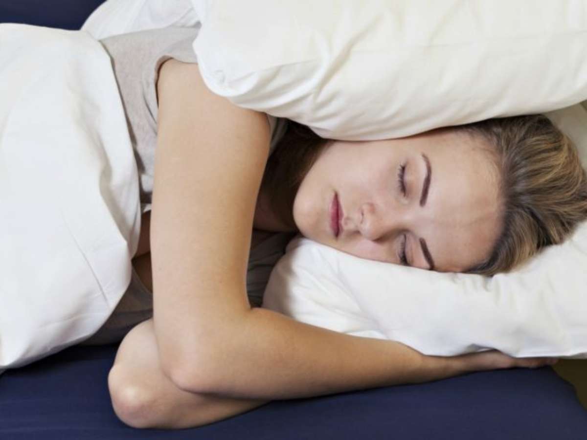 I've found that you can drown out noise while you sleep simply by placing a down pillow over each ear while sleeping on your side. I've found that you can drown out noise while you sleep simply by placing a down pillow over each ear while sleeping on your side.