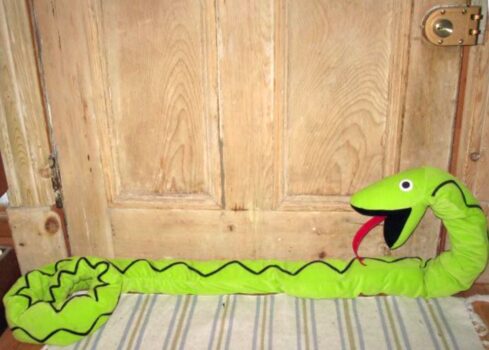 A dragon snake DIY door stopper as pictured in Good Housekeeping with tutorial.