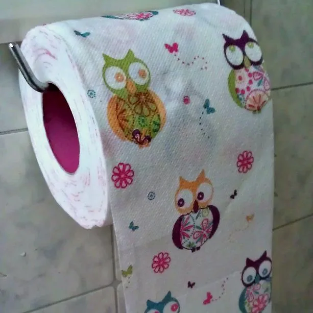Funny wise owl toilet paper that's hanging the CORRECT toilet paper roll direction! 