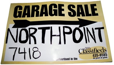 A simple garage sale sign. This is one of the free signs I used early in my yard sale career. It's simple, to the point, easy to read, and brightly colored -- all important qualities. My yard sale signs today look much nicer! 