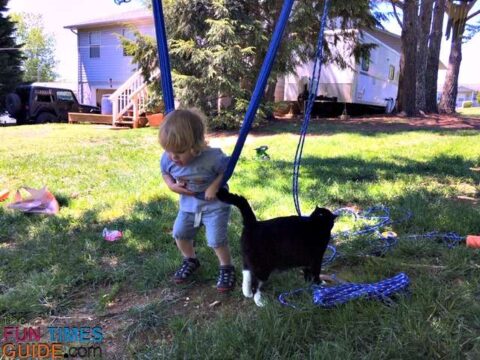A trampoline swing is best for my son at this age, because he isn't capable of climbing up onto a regular hammock swing yet. photo by Candida at TheFunTimesGuide.com