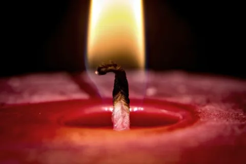 See how to trim a candle wick to the proper height.