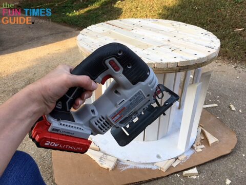 This is what it looks like after adding wood pieces to the top of this large wooden spool.