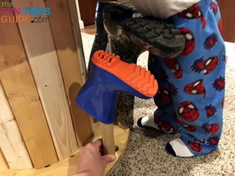 This DIY boot rack fits adult shoes and boots, as well as kids shoes and boots.