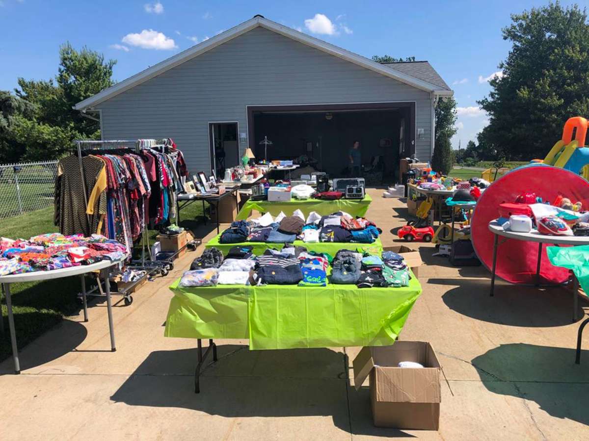 Bright colored tablecloths are best for your yard sale tables. Especially neon green and neon pink!