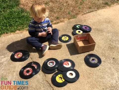 My 2-year-old son and my old collection of 45 rpm vinyl records.