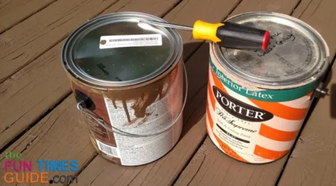 opening-old-leftover-paint-cans