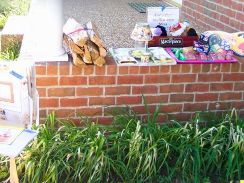 This is an example of using the porch steps as display space for your garage sale. 
