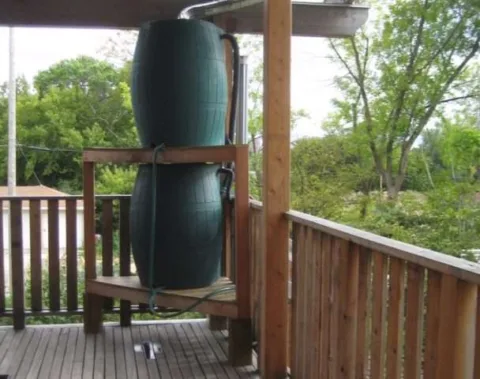 A gravity-fed rainwater collection system - rain barrels! 