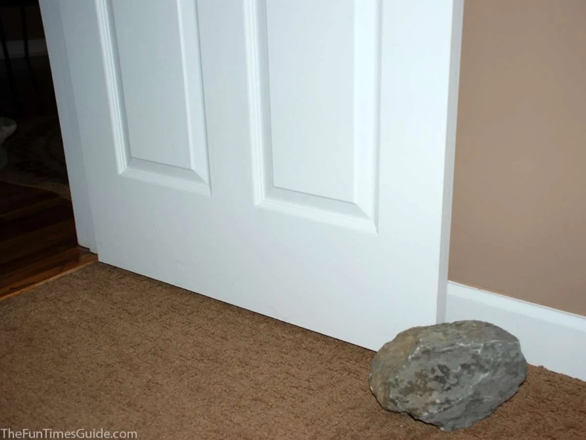 Using a large rock as a doorstop in my husband's office. 