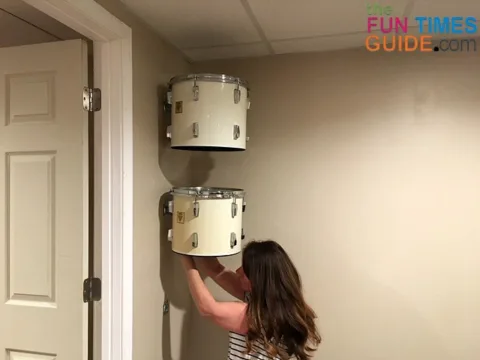 Two drums secured on the wall...