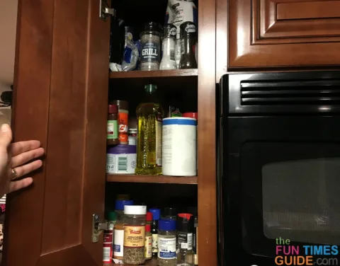 My cluttered spice cabinet in the kitchen.