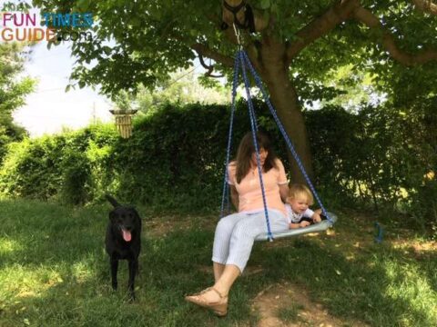 My son and I swinging together on our DIY tree swing. photo by Candida at TheFunTimesGuide.com