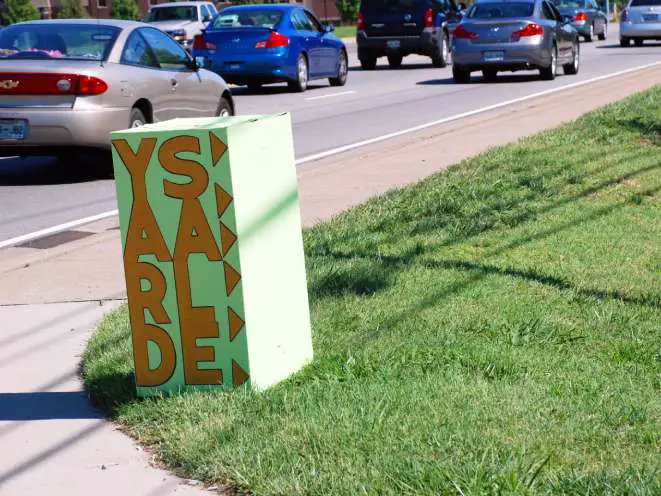 This is an attention-getting yard sale sign box -- because it's so TALL.