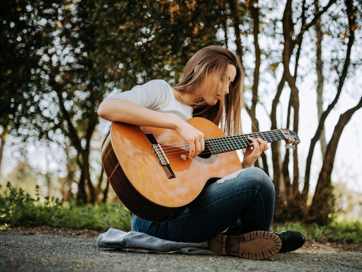 Wouldn't it be nice to have a friend play the guitar and sing (very low-key, no microphone) at your yard sale?!